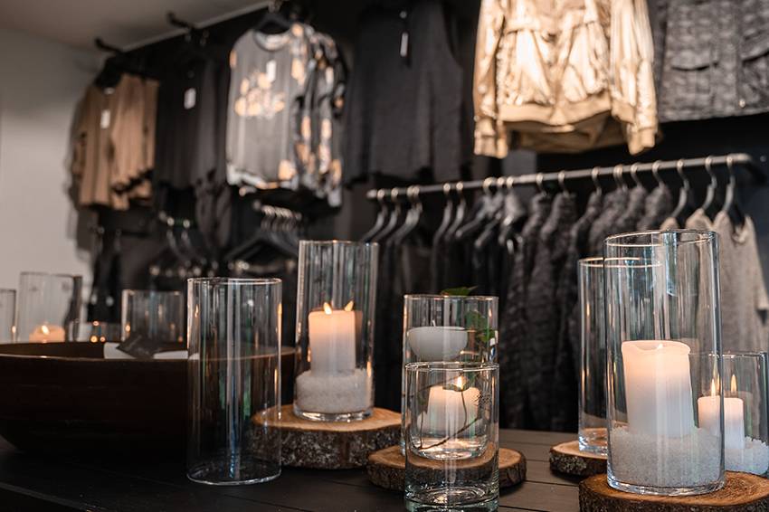 Candles and fashion in Dekomi Countryside's shop
